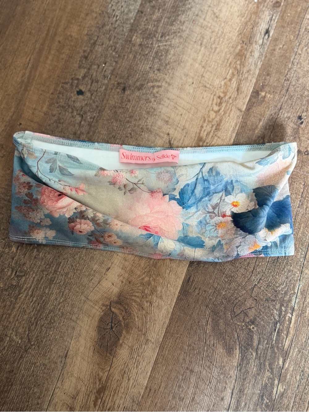 This is the Selkie bandeau bikini top in the Chateau Paper floral print